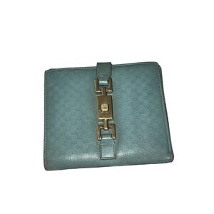 Gucci Microguccisima Piston Lock Trifold Wallet